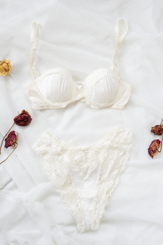 off white colored shiny vintage 80s romantic high waisted undergarment set