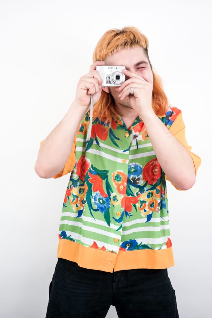 flowing vibrant see-through floral button-up shirt